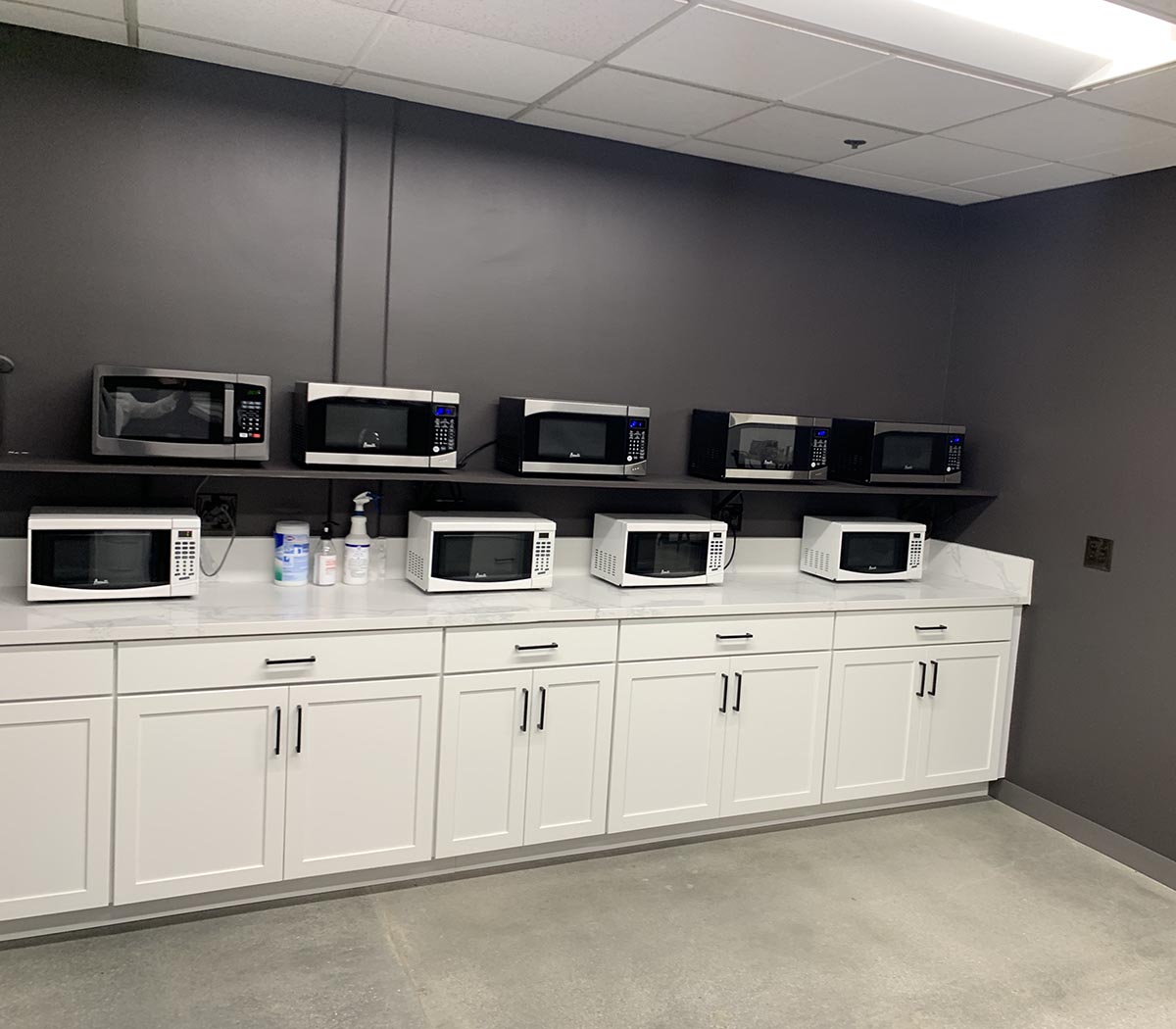 Employee Kitchen with new cabinets and shelf